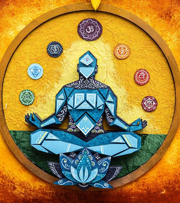 Colorful geometric artwork depicting meditation and chakra symbols, enhancing spiritual energy.
